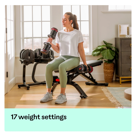 BowFlex SelectTech 1090i Adjustable Dumbbell (Single) in Use in Living room by Lady also using bench also 