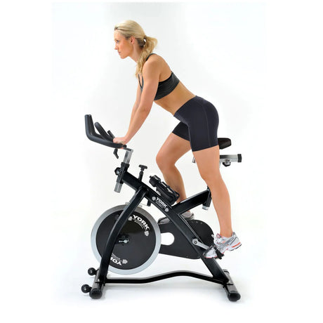 ork Barbell CSB32 Indoor Training Bike Women using 