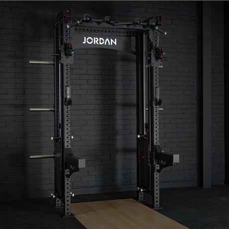 JORDAN® J75 Cable Rack Gym setting black brick background, Jordan olympic flooring, Spotter arms 