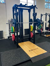 JORDAN® J75 Weight Lifting Platform - 60mm in a gym paired with J75 T Rack front view