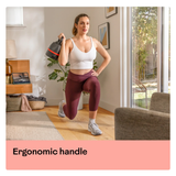 BowFlex 840 Kettlebell Being used by women in her living room 