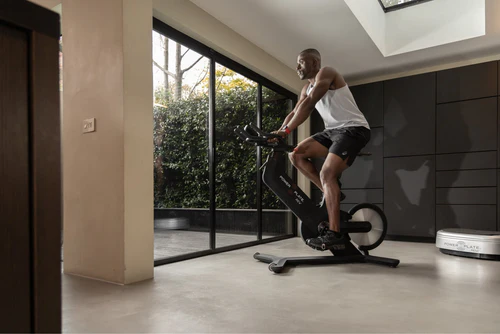 Power Plate REV Man Using in Home 